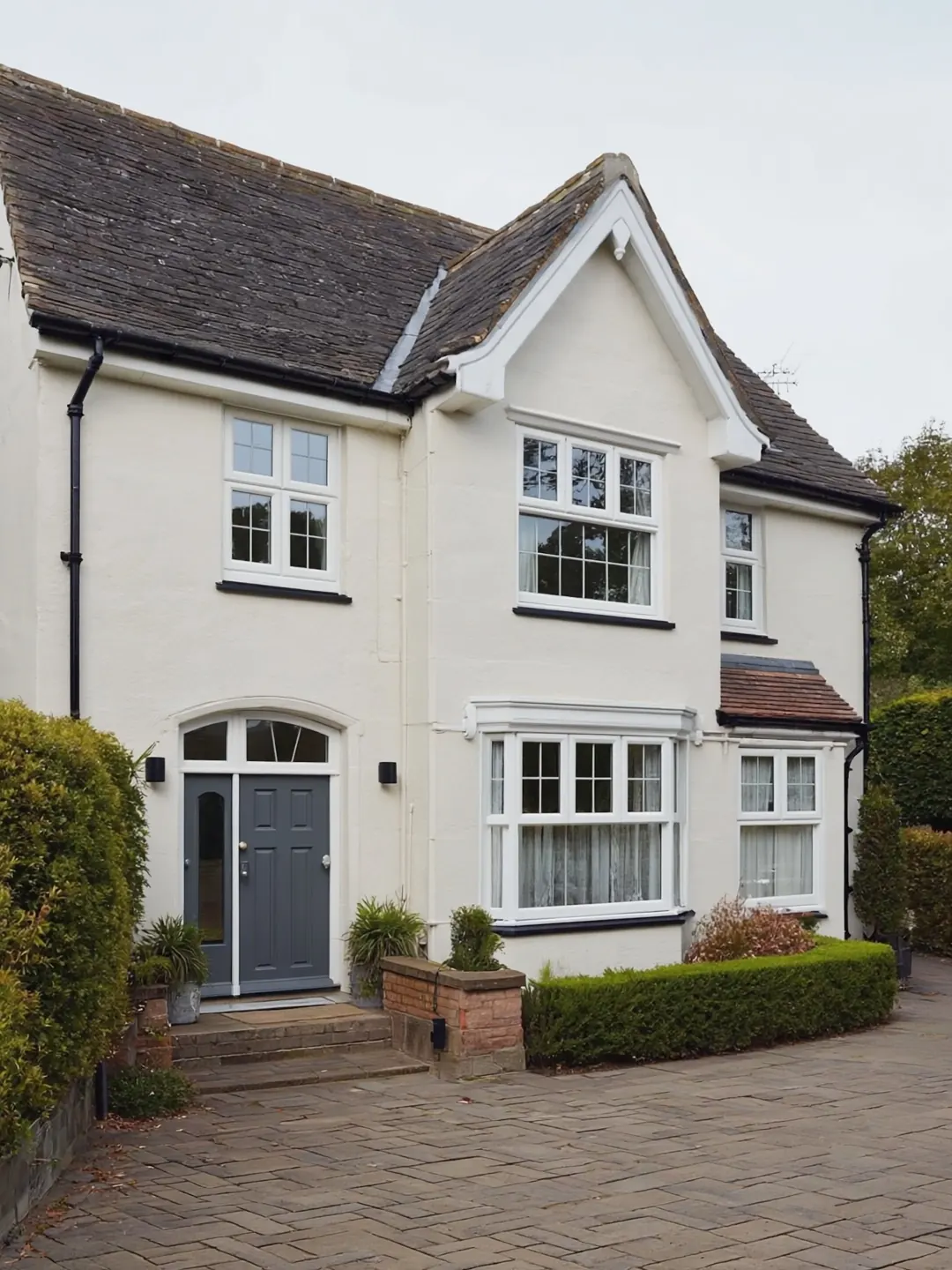Exterior House Painting — freshly sprayed finish