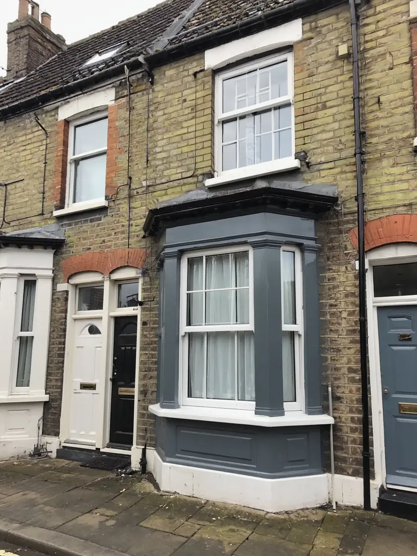 A terraced house with uPVC freshly resprayed